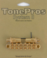 TonePros TPFA Metric Aluminum Tune-O-Matic Bridge with Bell Brass Saddles (gold)